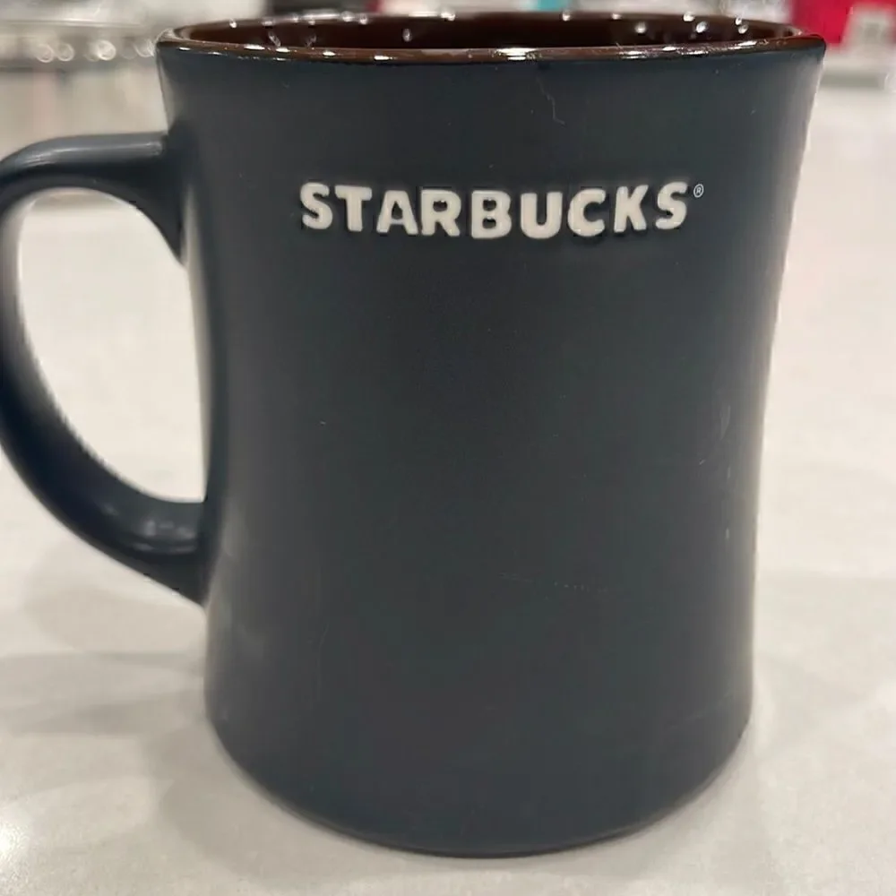 Starbucks French roast new bone china 2011 coffee cup brown on inside, nice feel